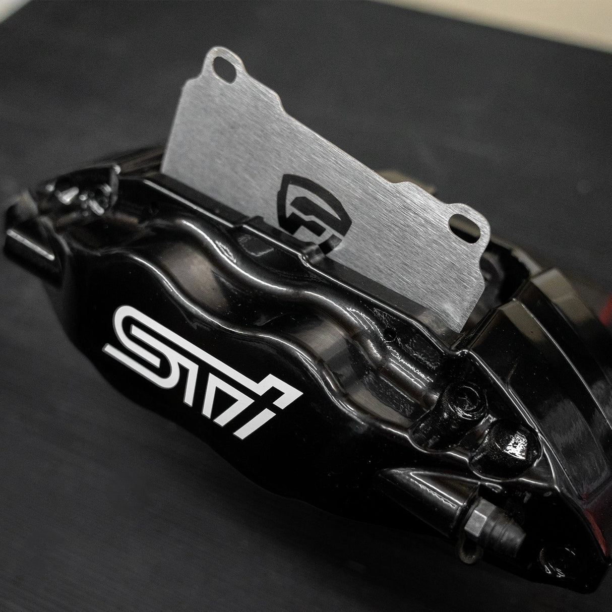 FactionFab Titanium Front Brake Shim Set 4 Piston Brembo Subaru 2004-2017 STI | FFA1.10315.1