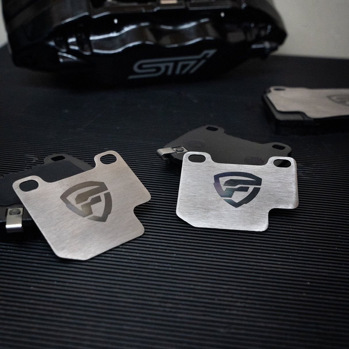 FactionFab Titanium Rear Brake Shim Set 2 Piston Brembo Subaru 2004-2017 STI | FFA1.10315.2